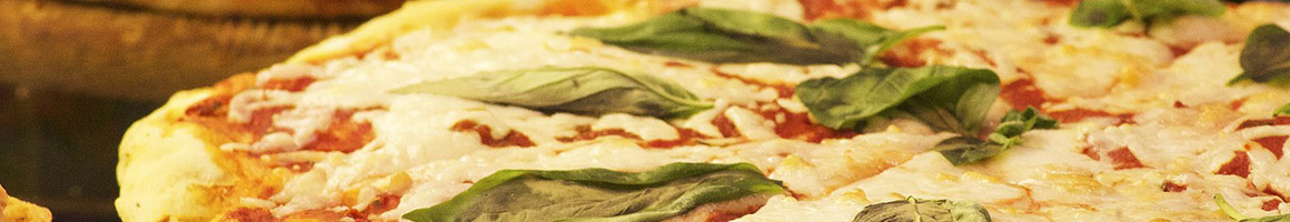 Eating Italian Pizza at Masseria dei Vini restaurant in New York, NY.